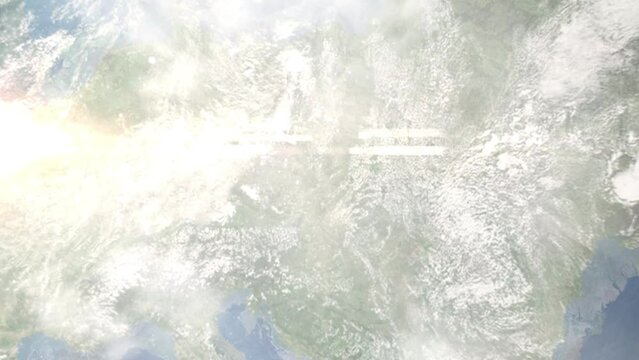 Earth zoom in from outer space to city. Zooming on Prostejov, Czech Republic. The animation continues by zoom out through clouds and atmosphere into space. Images from NASA