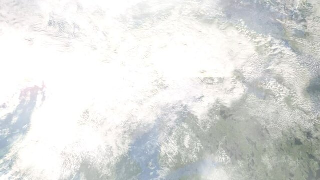 Earth zoom in from outer space to city. Zooming on Pitea, Sweden. The animation continues by zoom out through clouds and atmosphere into space. Images from NASA
