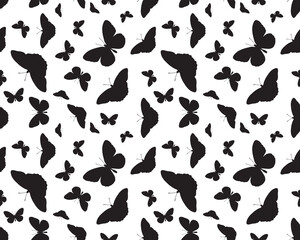 Obraz na płótnie Canvas Seamless pattern with black silhouettes of butterflies on white