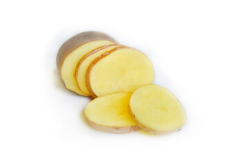 Isolated sliced unpeeled raw potato with the selective focus. Good for any project.
