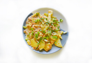 A homemade meal of potatoes and mushrooms with the selective focus. Good for any project.