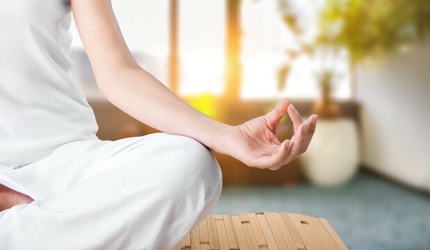 Girl feeling zen. Cute girl meditating unite with nature, hold hands raised lotus nirvana pose, practice yoga, inhale air, release stress, calm-down