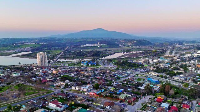 Dolly In Aerial View Of A Lower Middle Class Neighborhood In Concon, Chile With The Mauco Hill In The Background.