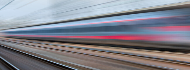 High speed train runs on rail tracks -Train in motion
