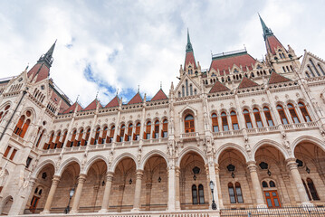 Fototapeta na wymiar Parliament building in Budapest. Hungary. The building of the Hungarian Parliament is located on the banks of the Danube River, in the center of Budapest.