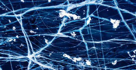 Banner Background texture of blue ice with cracks, aerial top view of Lake Baikal