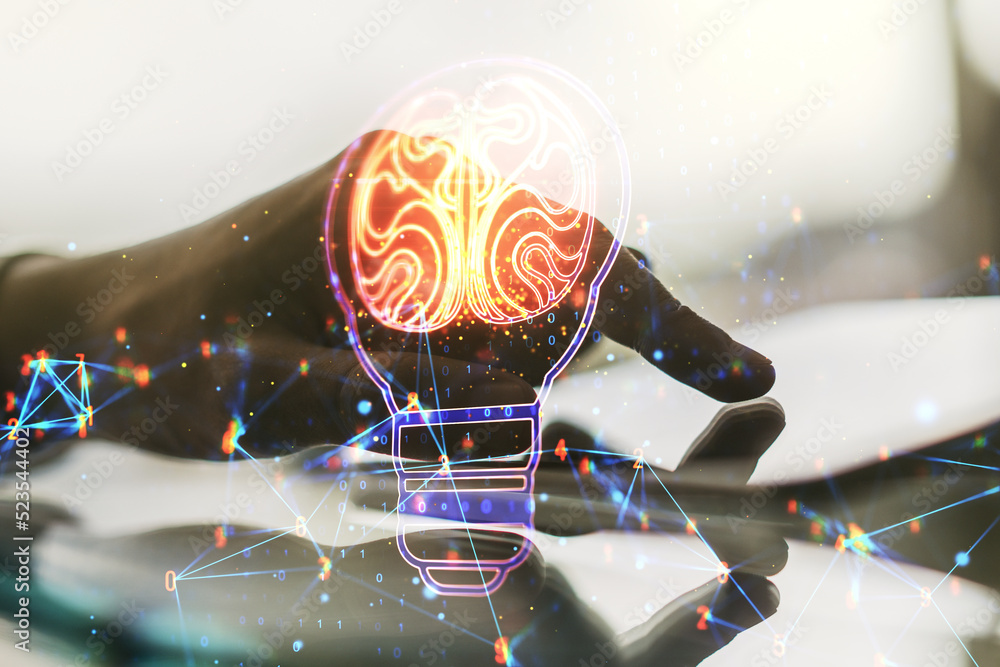 Poster creative light bulb with human brain hologram and hand working with a digital tablet on background, 
