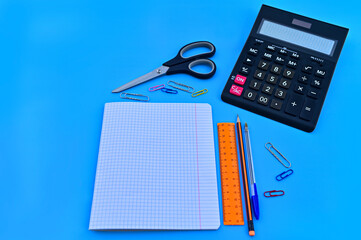 The concept of Back to School. September 1st. School supplies, accessories for the classroom - pencils, notebooks, scissors, paper clips. Space for copying. Business records.