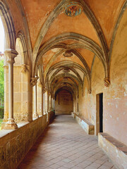 Fototapeta na wymiar Vaults and arches in cloister of gothic monastery of Sant Jeroni de la Murtra Monastery. Architecture and religious constructions.