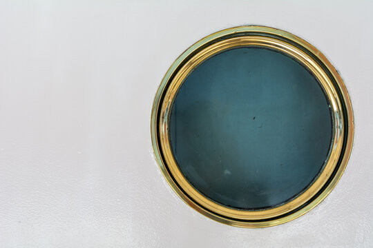 A Bull's eye window on a ship with copy space