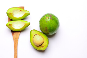 rotting avocado on a white background. avocado isolated on a white background. summer fruit