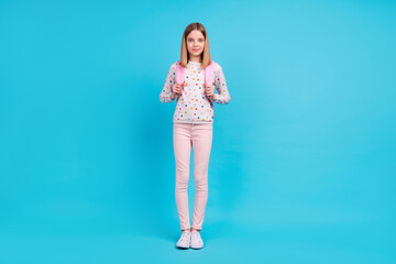 Full length photo of cute funny little lady dressed dotted pullover rucksack walking school...