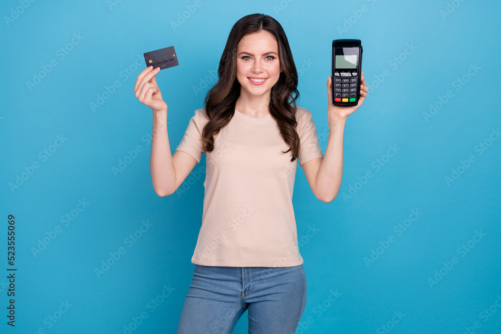 Sticker Photo of beautiful cheerful girl use wireless card to buy groceries use nfc transaction isolated on blue color background