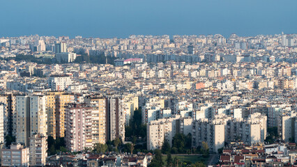 Obraz premium Urban jungle, multi-storey stone houses against the sky - the background of the city
