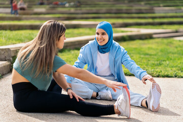 Runner Friends Stretching in the Park