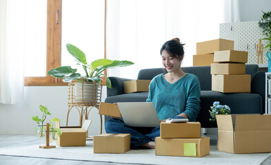 Portrait of young business asian woman online working in office desk use computer copyspace. Success business people employee, freelance SME online marketing work at home, coworking space concept