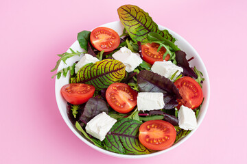 Fresh salad in big white bowl