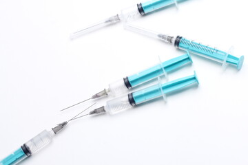 Fototapeta premium Disposable plastic syringe isolated on white
