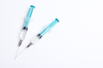 Disposable plastic syringe isolated on white