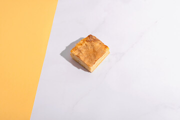 Fresh Serbian pita with cheese pastry on white background. Vivid colors.