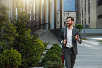 Satisfied Businessman in suit going home after long working day and looking at side