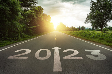 New year 2023 or straightforward concept. Text 2023 written on the road in the middle of asphalt...