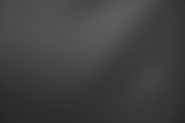 Dark black and gray blurred  gradient background has a little abstract light.