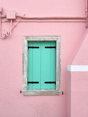 Windows in the colorful house in Burano