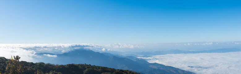 Kiew Mae Pan Viewpoint, Chom Thong District in Chiang Mai on Doi Inthanon with beautiful views of Blue sky and clouds on the weather day, mountains and grass, and nature mist in winter.