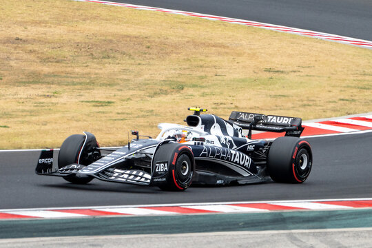 2022 Formula 1 Car at the Hungarian Grand Prix Race - AlphaTauri - Yuki Tsunoda - Race Day - Cornering - Mid