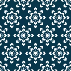 Behang Seamless pattern of snowflake on dark blue background vector. © pmpueng