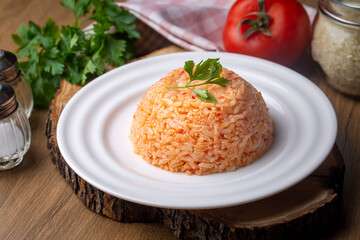 Traditional delicious Turkish food; rice pilaf with tomatoes (Turkish name; Domatesli pirinc pilavi)