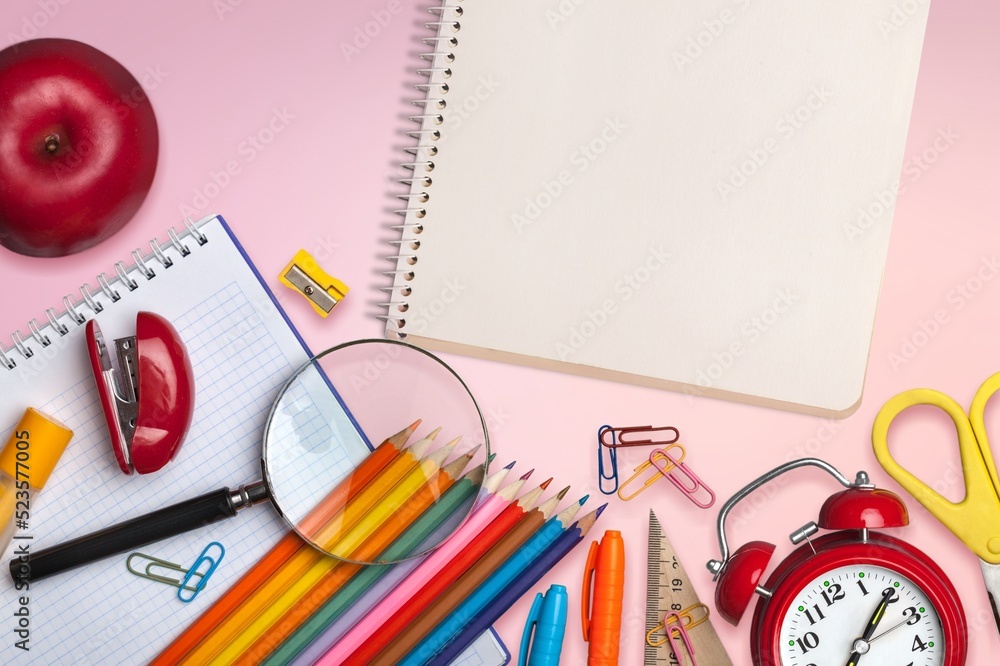 Sticker Back to school concept. Notepads pens erasers on  background