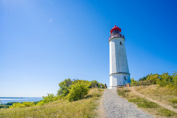 Fototapeta na wymiar Insel Hiddensee, Germany. 12. August. 2022. Lighthouse Dornbusch of Hiddensee Island Baltic coast.