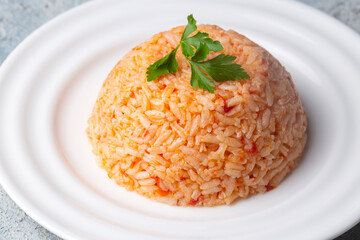 Traditional delicious Turkish food; rice pilaf with tomatoes (Turkish name; Domatesli pirinc pilavi)