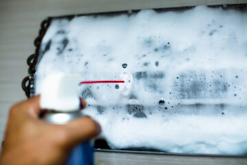 Selective focus to foam spray to cleaning air conditioner.