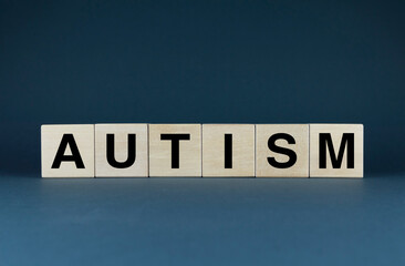 Autism. Cubes form the word Autism. Concept of Autism - a disease of the nervous system