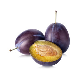 Plum fruit isolated on white background. Three fresh prunes whole and cut half. Clipping path