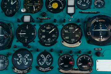 Toggle switches old soviet helicopter mi2 many text Russian language which translates Light danger...