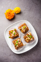 Dodha Barfi or Doda Burfi is a traditional Indian sweet, which has a grainy and chewy texture