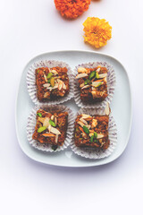 Dodha Barfi or Doda Burfi is a traditional Indian sweet, which has a grainy and chewy texture