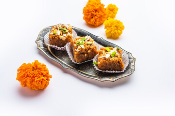 Dodha Barfi or Doda Burfi is a traditional Indian sweet, which has a grainy and chewy texture