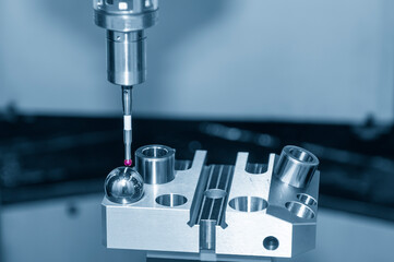 The CMM probe calibration operation with sphere ball part.