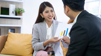 asian couple working at office