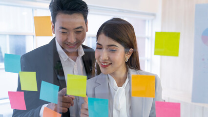 asian couple at office