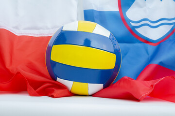 Volleyball ball with flags of Poland and Slovenia, host countries of Volleyball World Championship...