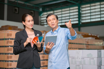 Factory manager talking with quality control team in food factory for food quality business export...