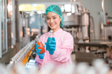 Asian woman employee working Food quality control in Factory and worker inspecting production line...