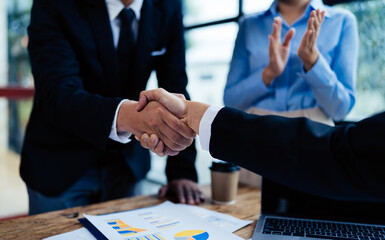 Business people shaking hands, finishing up meeting. business hand shake concept.