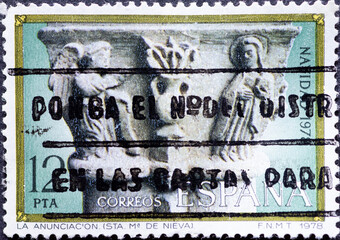 SPAIN - CIRCA 1978 : a postage stamp from Spain, showing Christmas motifs on a historic column...